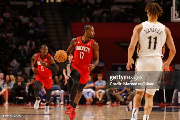 Tari Eason of the Houston Rockets brings the ball up court against the New Orleans Pelicans at Legacy Arena at the BJCC in Birmingham, Alabama on...