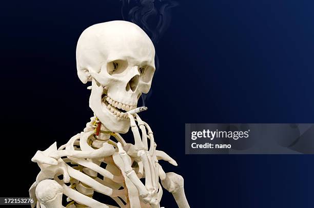 taking a drag - smoker skull stock pictures, royalty-free photos & images