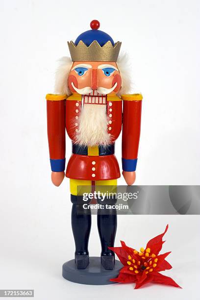 christmas nutcracker & poinsettia - nutcracker stock pictures, royalty-free photos & images