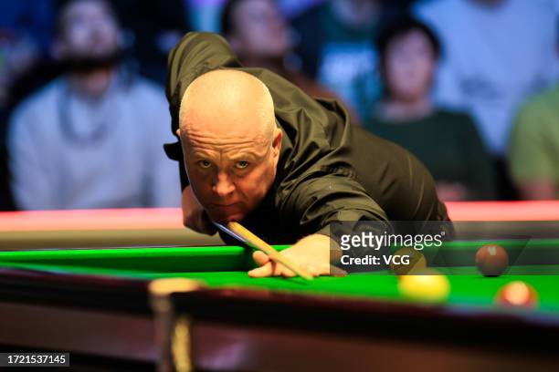 John Higgins of Scotland plays a shot in the Quarterfinal match against Martin O'Donnell of England on day 5 of 2023 BetVictor English Open at the...