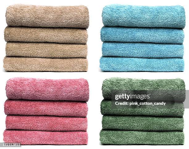 four sets of towels - ihopvikt bildbanksfoton och bilder
