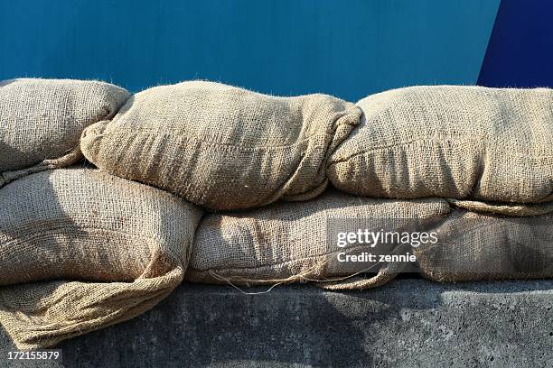 sandbags for flood control - sandbag stock pictures, royalty-free photos & images