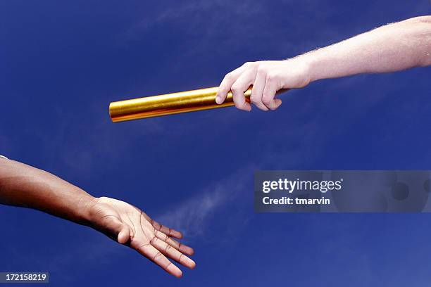 handoff 1 - relay baton stock pictures, royalty-free photos & images