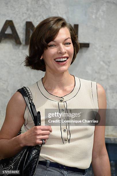 Milla Jovovich attends the Chanel show as part of Paris Fashion Week Haute Couture Fall/Winter 2013-2014 at Grand Palais on July 2, 2013 in Paris,...