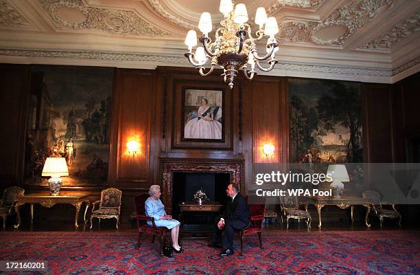 Queen Elizabeth II talks to the Scottish First minister Alex Salmond during an audience at the Palace of Holyrood House on July 2, 2013 in Edinburgh,...