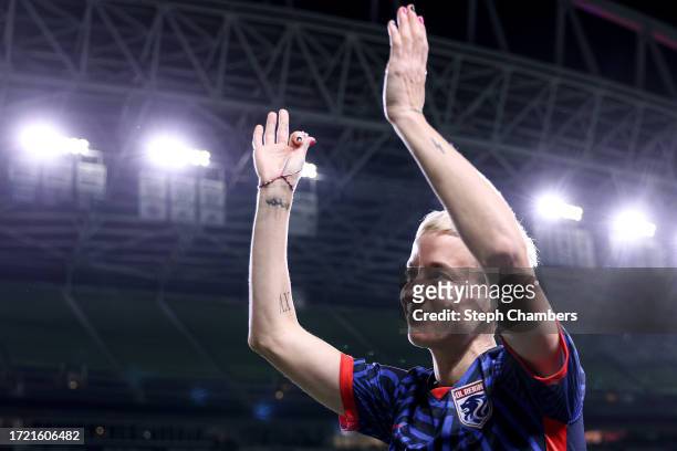 Megan Rapinoe of OL Reign waves to fans after her last home regular-season NWSL match at Lumen Field on October 06, 2023 in Seattle, Washington.