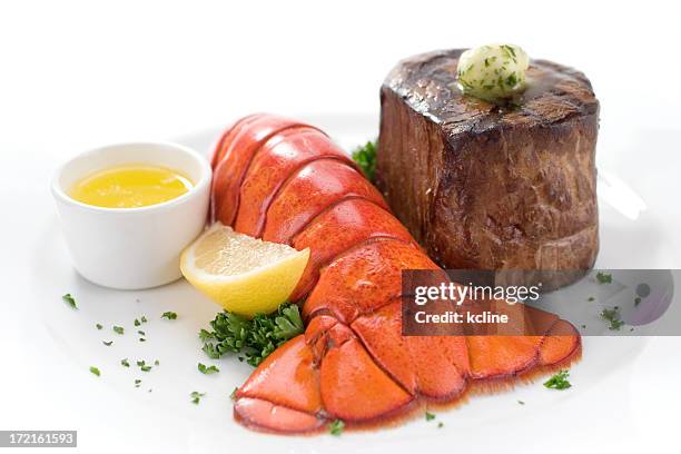 a steak and lobster with lemon - lobster dinner stock pictures, royalty-free photos & images