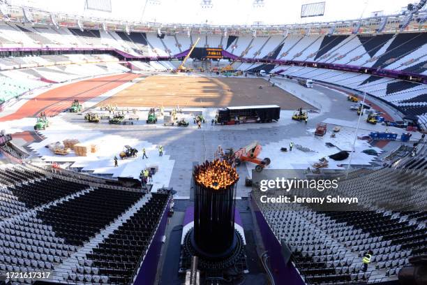 ..Relocation Of The Flame Cauldron At The Olympic Stadium Today To A New Permanent Position Following The Opening Ceremony..Jeremy Selwyn/Evening...