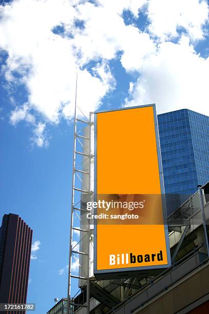 billboard in the city - vertical billboard stock pictures, royalty-free photos & images