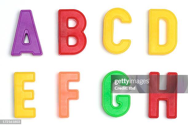 colored plastic letters a through h - bokstavsmagnet bildbanksfoton och bilder