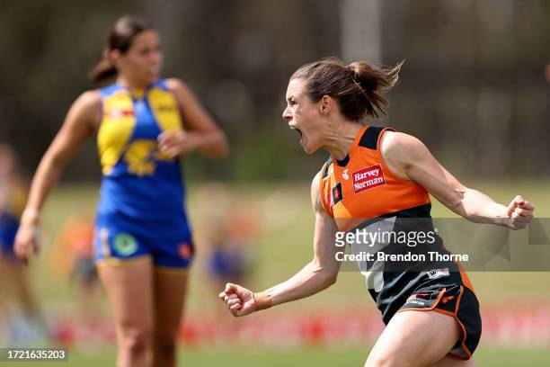 Alicia Eva of the Giants celebrates after kicking a goal during the round six AFLW match between Greater Western Sydney Giants and West Coast Eagles...