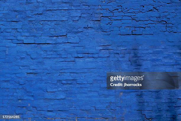 blue brick wall - graffiti wall stockfoto's en -beelden