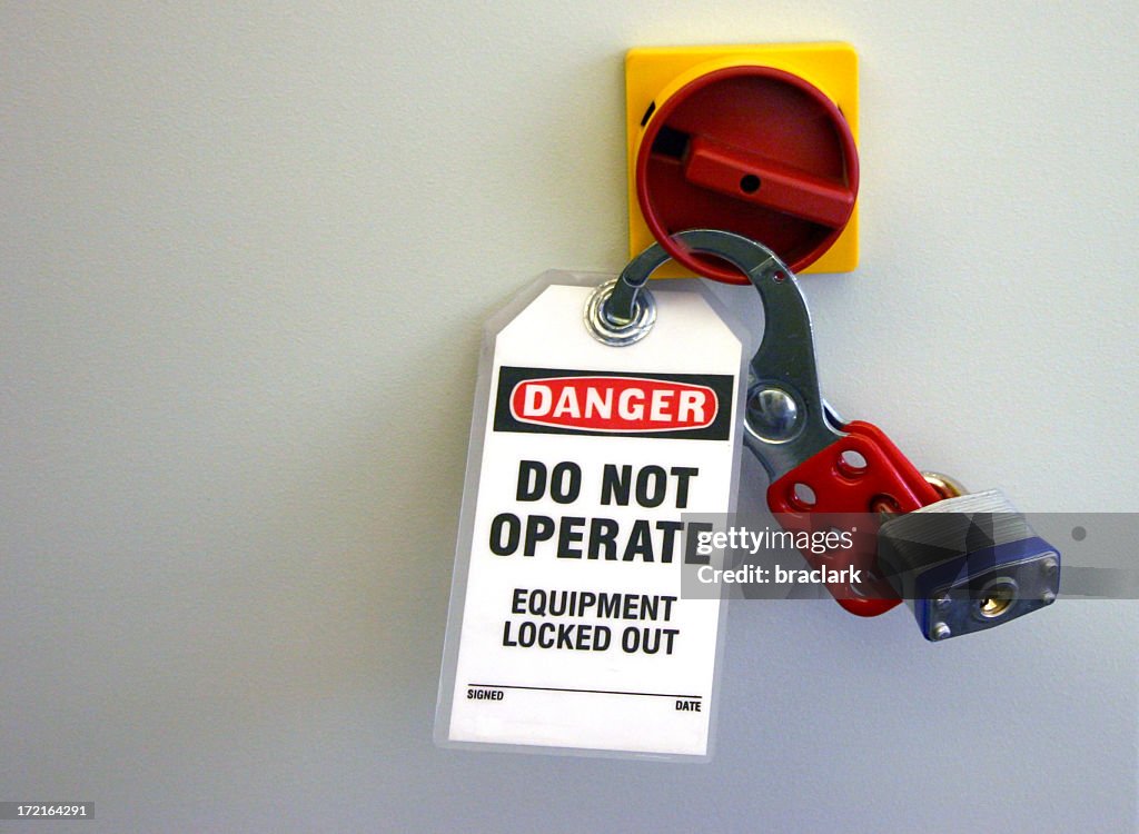 Locked equipment with locks and danger sign notice