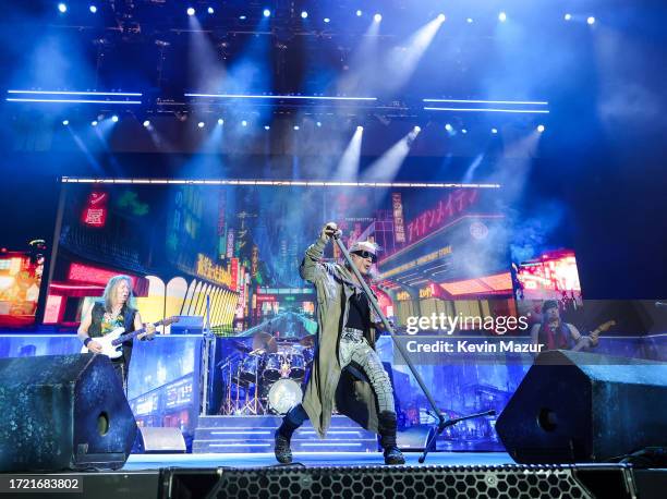 Dave Murray, Bruce Dickinson, and Adrian Smith of Iron Maiden perform onstage during the Power Trip music festival at Empire Polo Club on October 06,...
