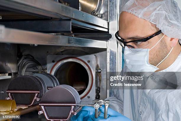 technician working with silicon wafers - nuclear reactor bildbanksfoton och bilder