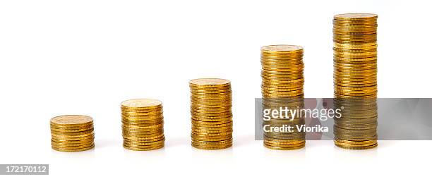 business graph made of coins on a white background - coins stockfoto's en -beelden