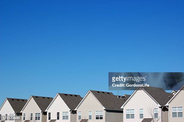 uniformity in housing - up on a roof stock pictures, royalty-free photos & images