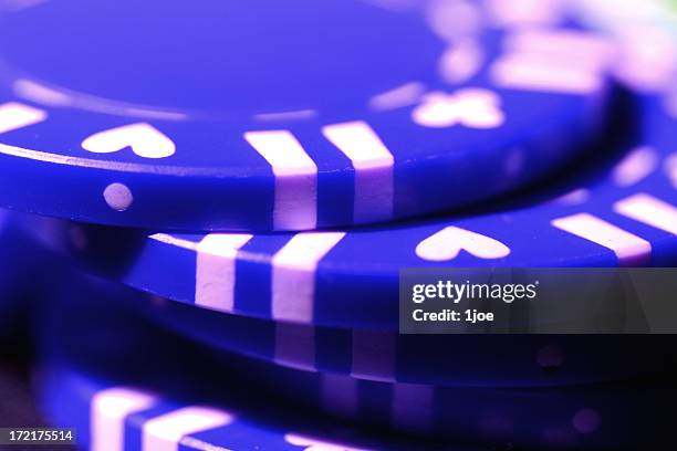 stack-o-blue - gambling chip stock pictures, royalty-free photos & images