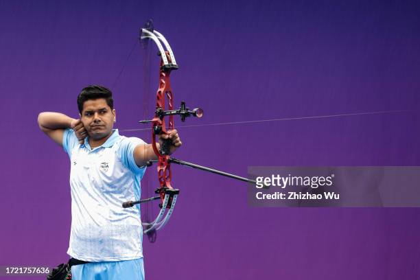 Abhishek Verma of India competes against Ojas Pravin Deotale of India in the Men's Individual Gold Medal Match of Archery Compound during day 14 of...