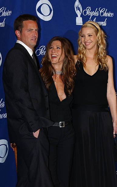 Actors Matthew Perry, Jennifer Aniston and Lisa Kudrow pose backstage at the 29th Annual People's Choice Awards at the Pasadena Civic Center January...