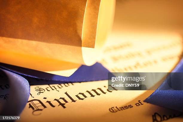 close up of a graduation diploma - diploma stock pictures, royalty-free photos & images