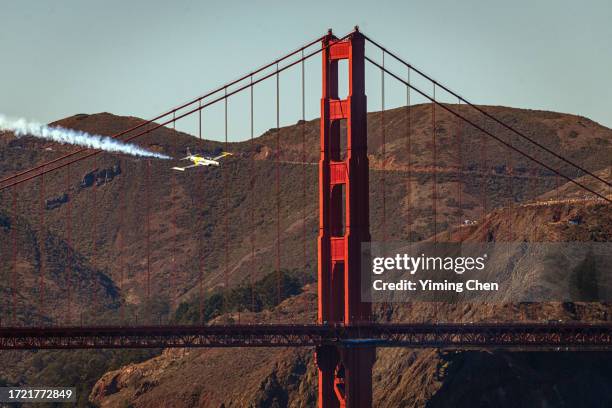 san francisco fleet week air show - t-33 shooting star flying golden gate bridge - concorde in flight stock pictures, royalty-free photos & images