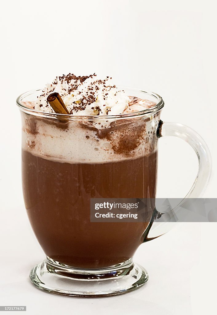 Hot beverage with whipped cream and sprinkled chocolate