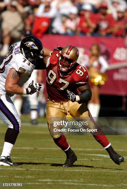 Bryant Young of the San Francisco 49ers rushes up against Marshal Yanda of the Baltimore Ravens during an NFL football game on October 7, 2007 at...