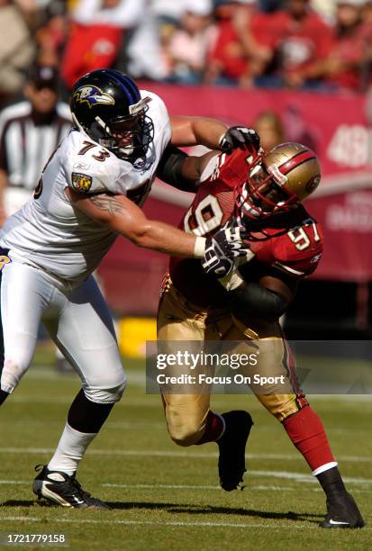 Bryant Young of the San Francisco 49ers rushes up against Marshal Yanda of the Baltimore Ravens during an NFL football game on October 7, 2007 at...