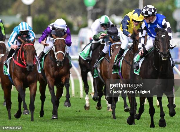 Mark Zahra riding Gold Trip looks over his shoulder before winning Race 8, the Tab Turnbull Stakes, during Melbourne Racing at Flemington Racecourse...