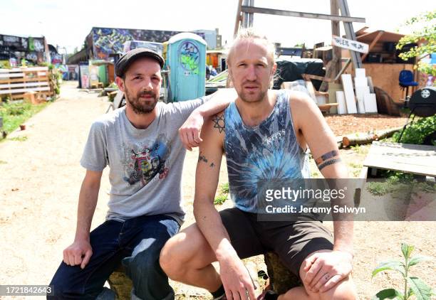Freelance Courier Damien Doughty And Director Jimmy Wheale In The Normadic Community Garden In London....Damien Doughty A Cycle Courier Left...