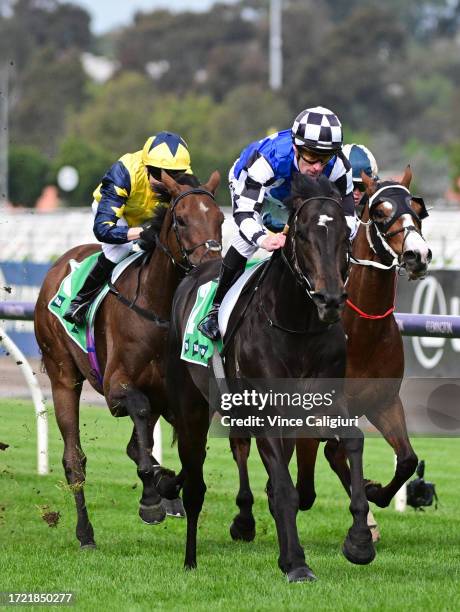 Mark Zahra riding Gold Trip defeats Jamie Spencer riding West Wind Blows in Race 8, the Tab Turnbull Stakes, during Melbourne Racing at Flemington...