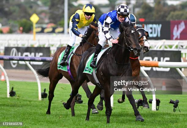 Mark Zahra riding Gold Trip defeats Jamie Spencer riding West Wind Blows in Race 8, the Tab Turnbull Stakes, during Melbourne Racing at Flemington...