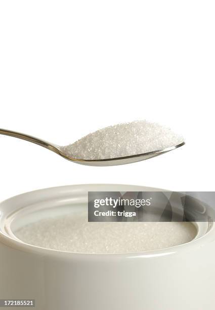 spoonful of sugar - sugar spoon stock pictures, royalty-free photos & images