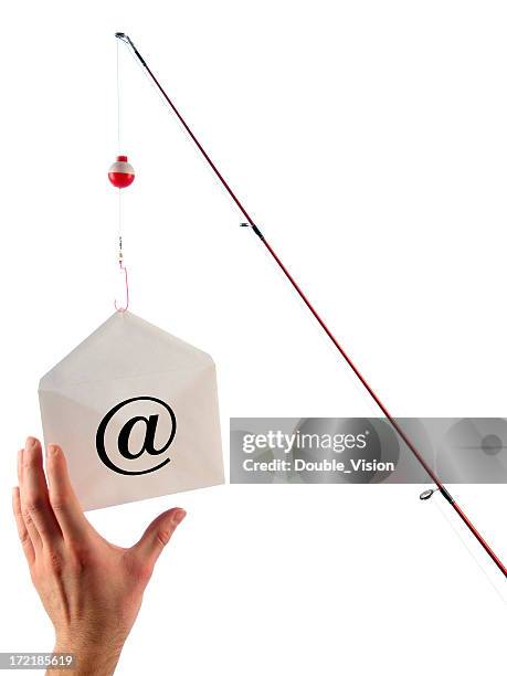 phishing concept: fishing pole dangles email and hand takes bait - rod stock pictures, royalty-free photos & images