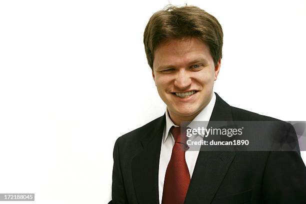 business man cheesy grin you can trust me - miserly stock pictures, royalty-free photos & images