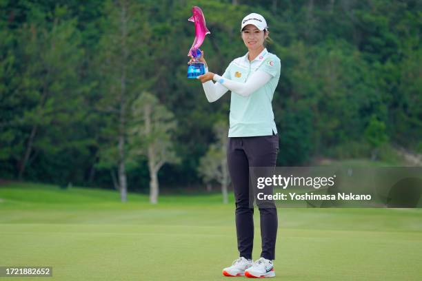 Saipan of Thailand poses with the trophy after winning the tournament following the final round of Kanehide Miyarabi Open at Kanehide Kise Country...