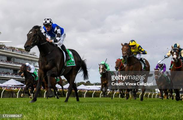 Mark Zahra riding Gold Trip defeats Jamie Spencer riding West Wind Blows and Craig Williams riding Soulcombe in Race 8, the Tab Turnbull Stakes,...