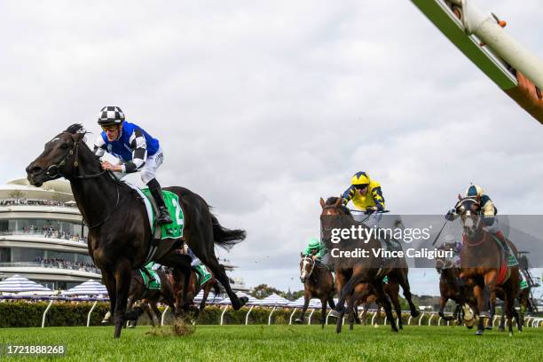 Mark Zahra riding Gold Trip defeats Jamie Spencer riding West Wind Blows and Craig Williams riding Soulcombe in Race 8, the Tab Turnbull Stakes,...