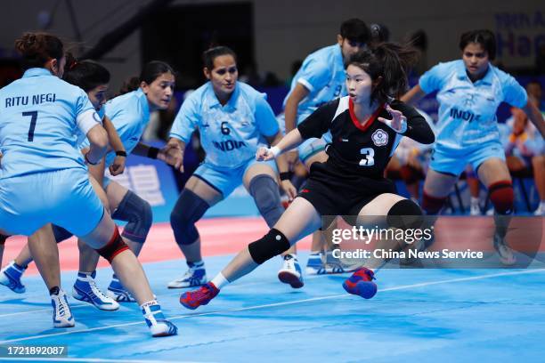 Hu Yu-Chen of Team Chinese Taipei competes against Team India in the Kabaddi - Women's Team Final on day 14 of the 19th Asian Games at Xiaoshan Guali...