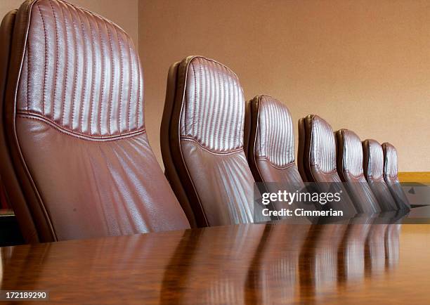 meeting table - leather office chair stock pictures, royalty-free photos & images