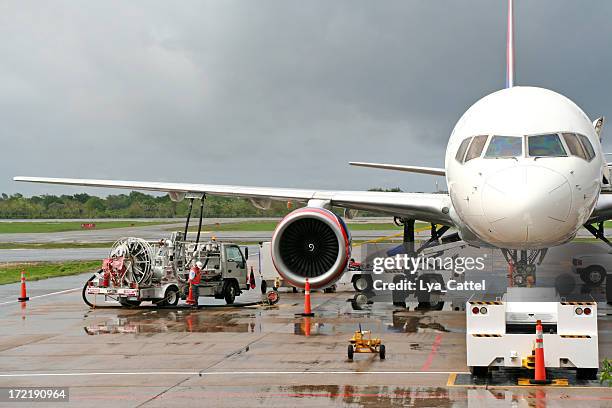 refuelling an airplane on the airport # 1 - aircraft refuelling stock pictures, royalty-free photos & images