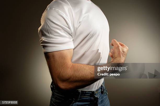 white t shirt series - arm flexing stock pictures, royalty-free photos & images