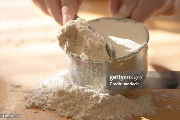 flour - measuring cup stock pictures, royalty-free photos & images