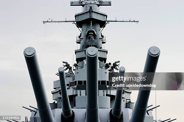 close-up front of battleship u.s.s. alabama with retro tint - militair schip stockfoto's en -beelden