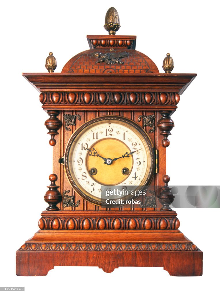 Old vintage clock with wooden ornaments
