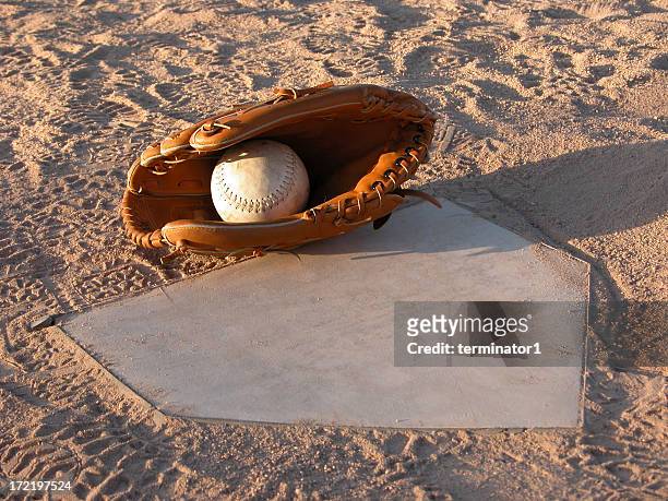 tag at home plate - softball glove stock pictures, royalty-free photos & images