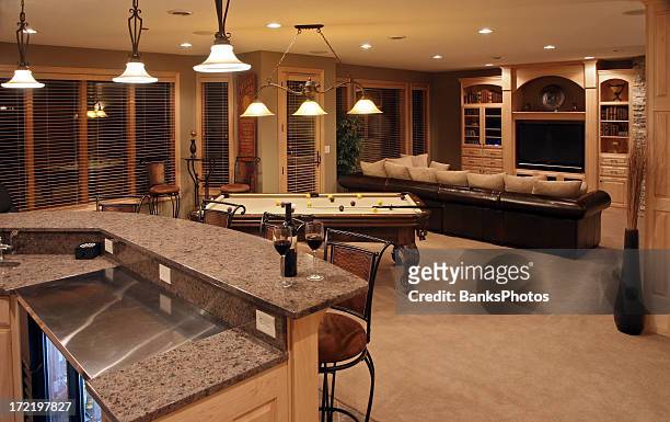 executive home bar and entertainment room - basement stock pictures, royalty-free photos & images