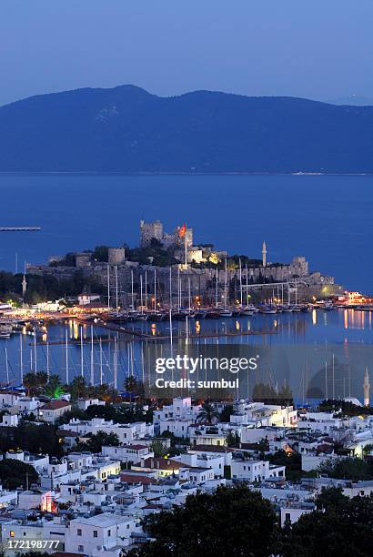 castle of st peter in bodrum, turkey at dusk - mugla province stock pictures, royalty-free photos & images