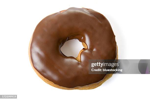 chocolate glazed donut - donut stock pictures, royalty-free photos & images